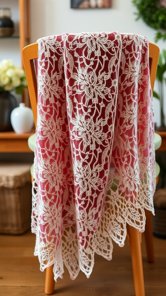 A beautiful hairpin lace shawl with a floral design draped over a chair.