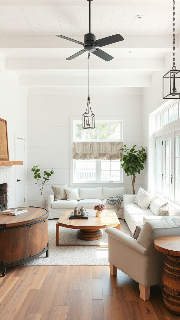 A modern farmhouse living room with whitewashed walls, natural wood accents, and large windows.