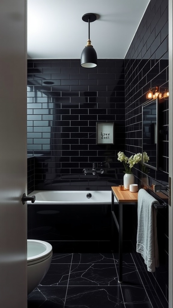 A stylish black bathroom featuring dark tiles, a bathtub, and a modern black mirror.