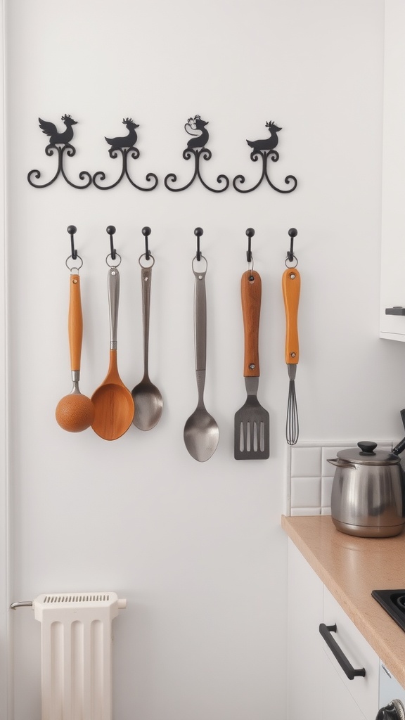 Decorative hooks displaying various kitchen utensils on a wall.