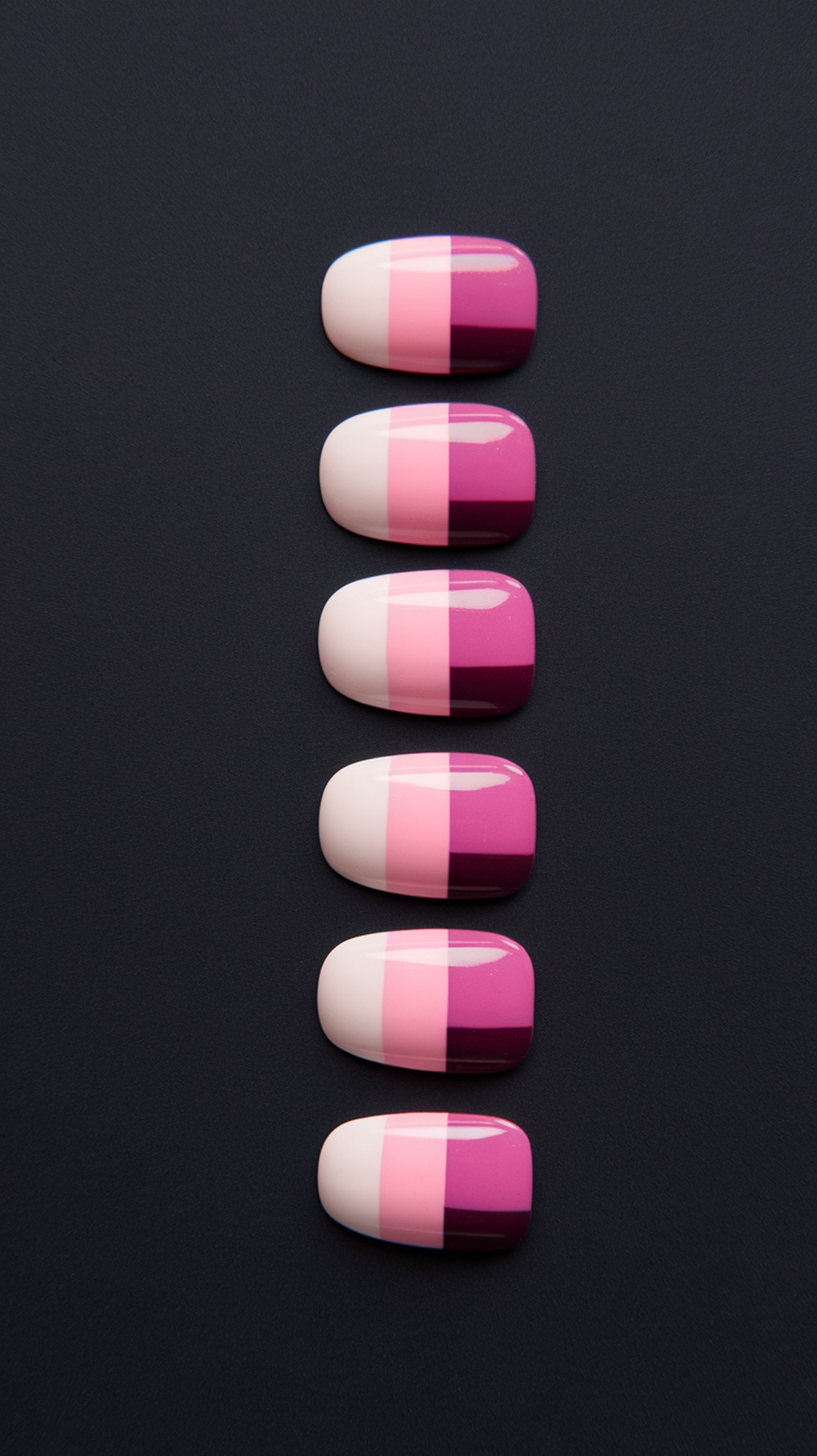 Gradient color block nails in shades of pink