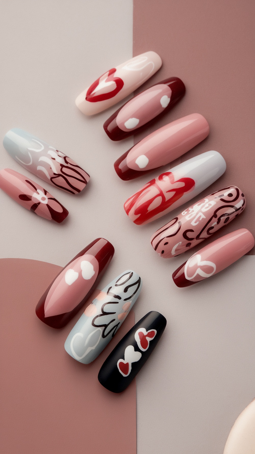 Nail designs featuring a matte finish with glossy tips in various colors and patterns.