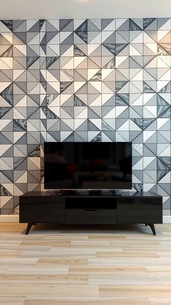 A modern living room with a geometric patterned wall featuring black, white, and grey triangles, a sleek black TV, and a low-profile media console.