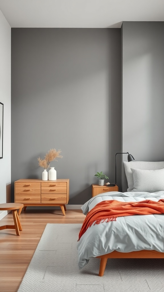 A modern grey bedroom featuring natural wood furniture and warm accents