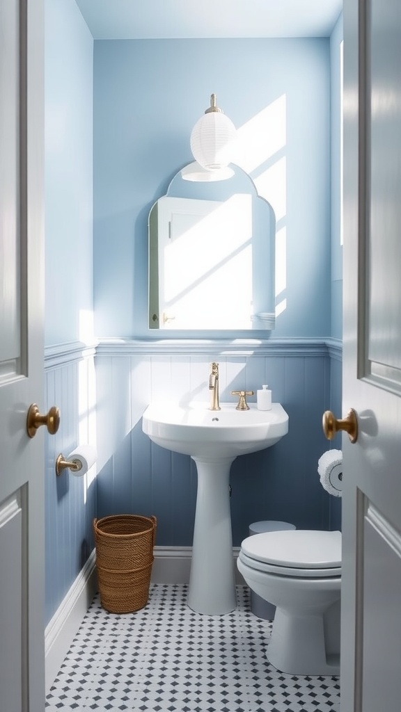 A small bathroom featuring Revel Blue and Icelandic paint colors from Sherwin-Williams, with a round mirror and light fixture.