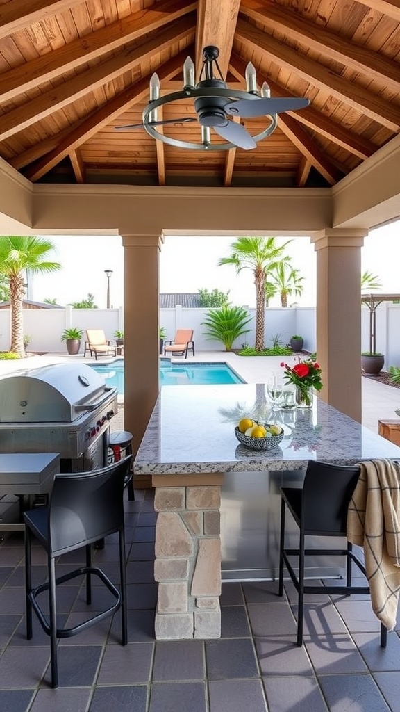 Outdoor kitchen cabana with grill and view of a swimming pool