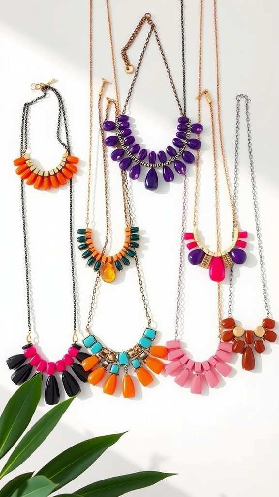 A collection of colorful chunky statement necklaces displayed on a white background.