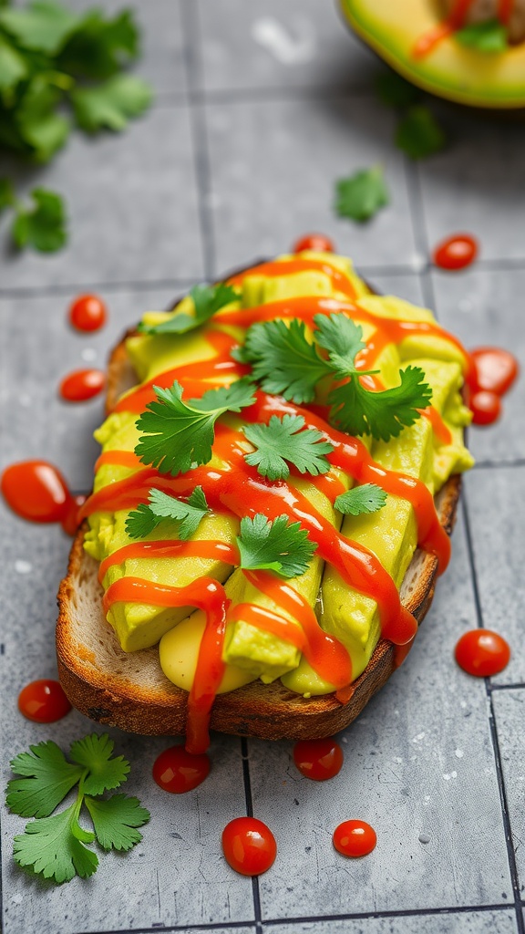 Spicy avocado toast topped with hot sauce and cilantro.