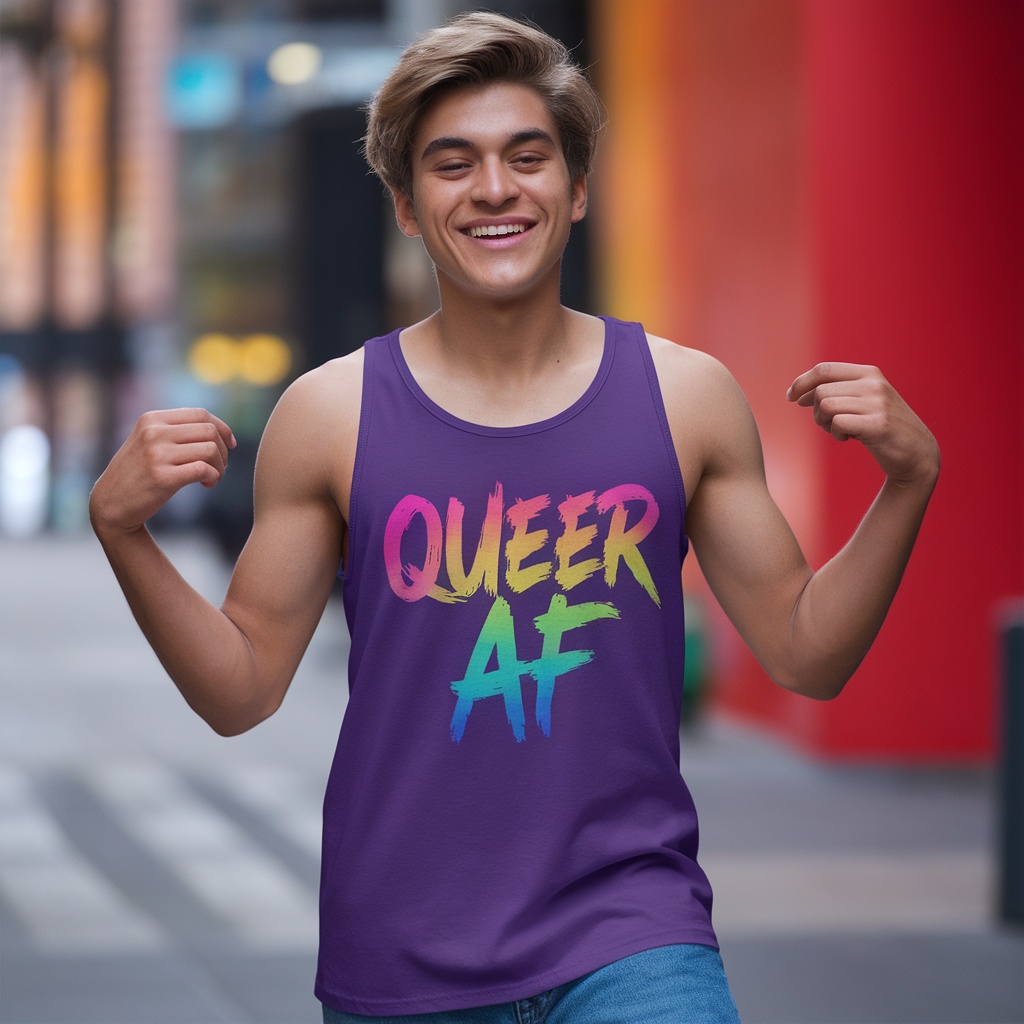 A young person wearing a purple tank top that says 'QUEER AF' in colorful letters, flexing their arms with a joyful expression.