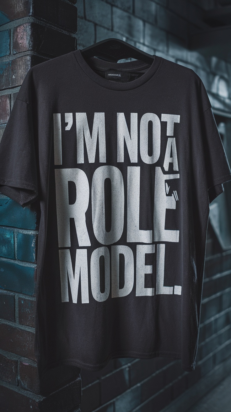 A black t-shirt with bold white text saying 'I'M NOT A ROLE MODEL.'