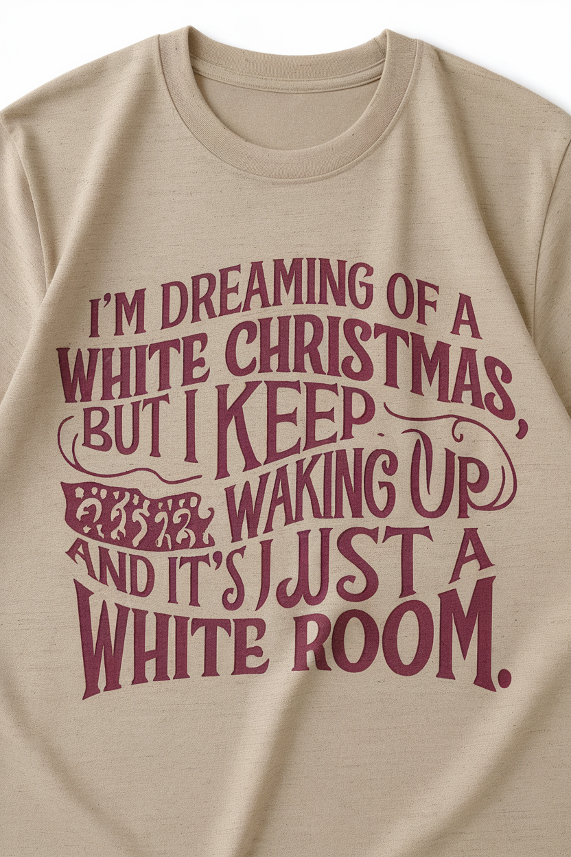 A beige t-shirt with a humorous holiday quote about dreaming of a white Christmas.