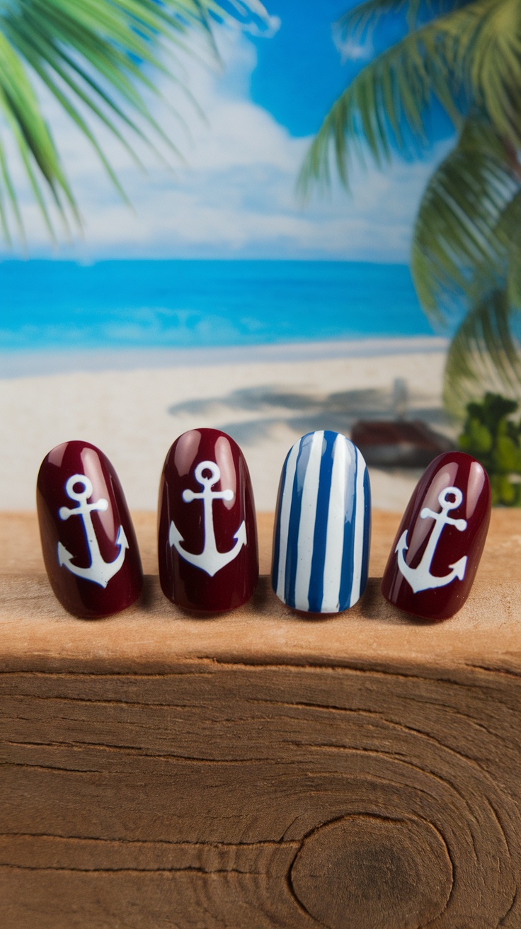 Nautical inspired dark cherry red nails featuring white anchors and blue stripes