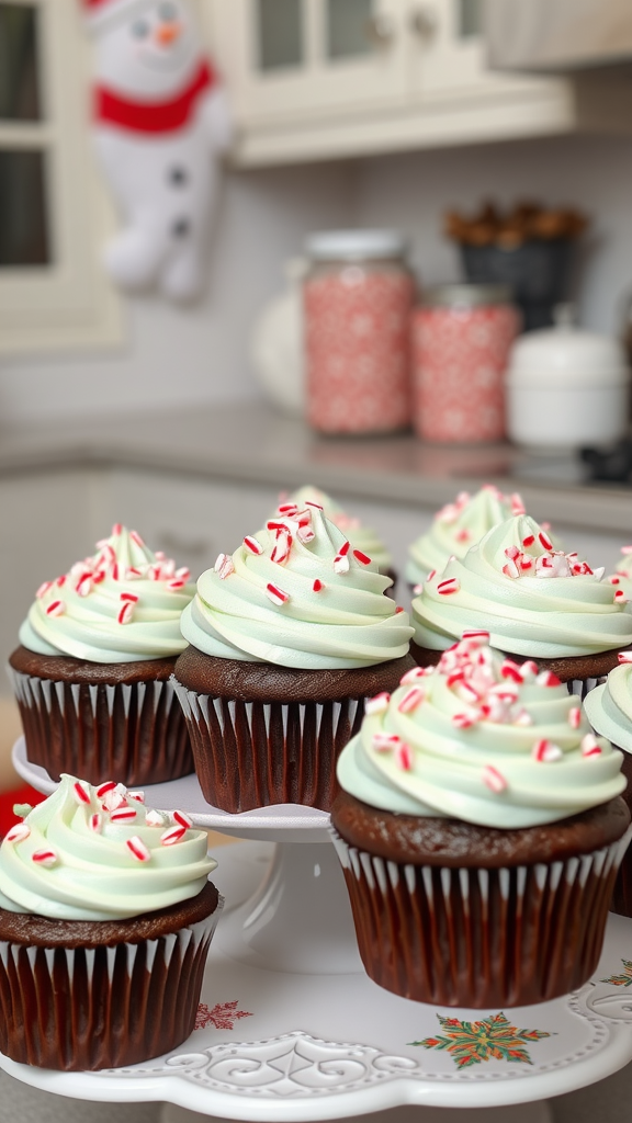 A platter of chocolate peppermint cupcakes with green frosting and peppermint pieces on top, surrounded by festive decorations.