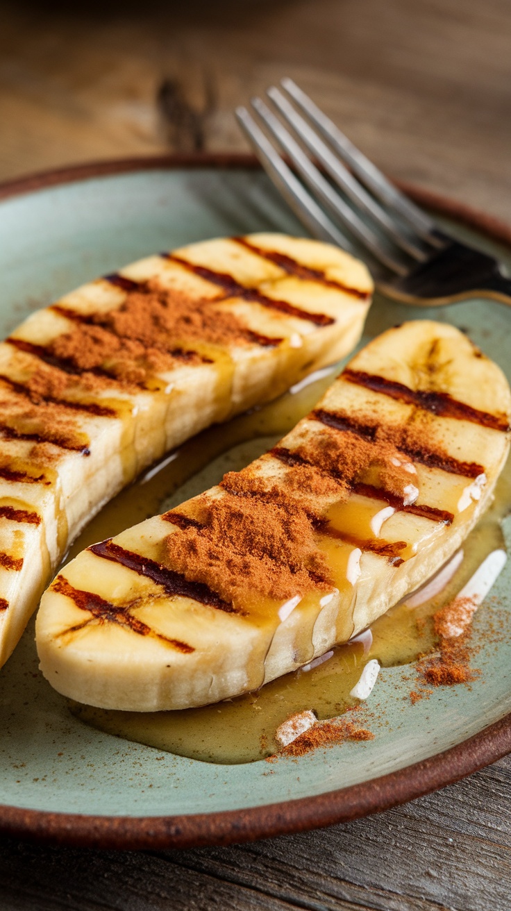 Grilled bananas drizzled with honey and sprinkled with cinnamon on a plate