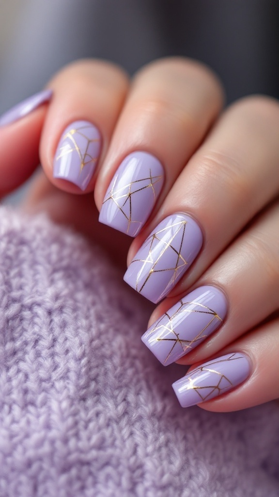 Lilac nails with gold geometric art displayed on a stand