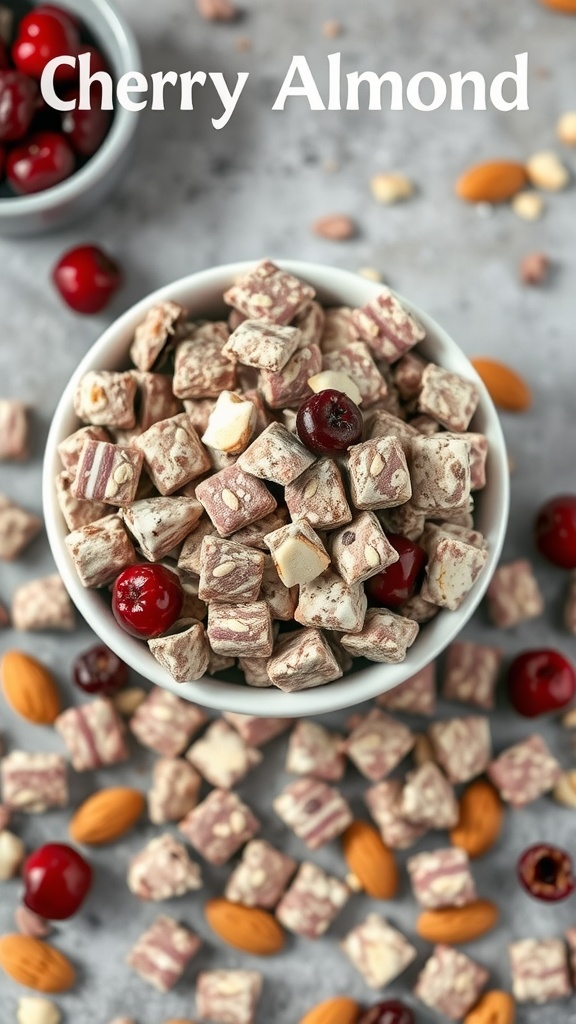 A bowl of Cherry Almond Muddy Buddies surrounded by almonds and cherries.