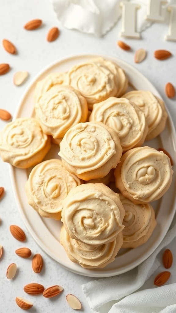 Vanilla almond keto cream cheese cookies arranged on a plate with almonds scattered around.