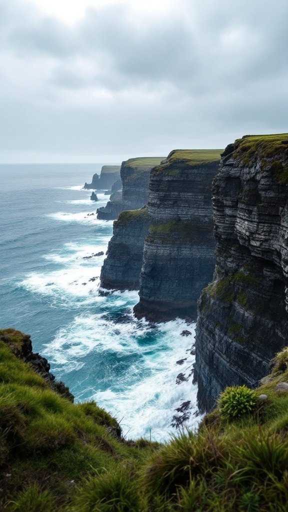Cliffs of Moher overlooking the ocean with green grass in the foreground