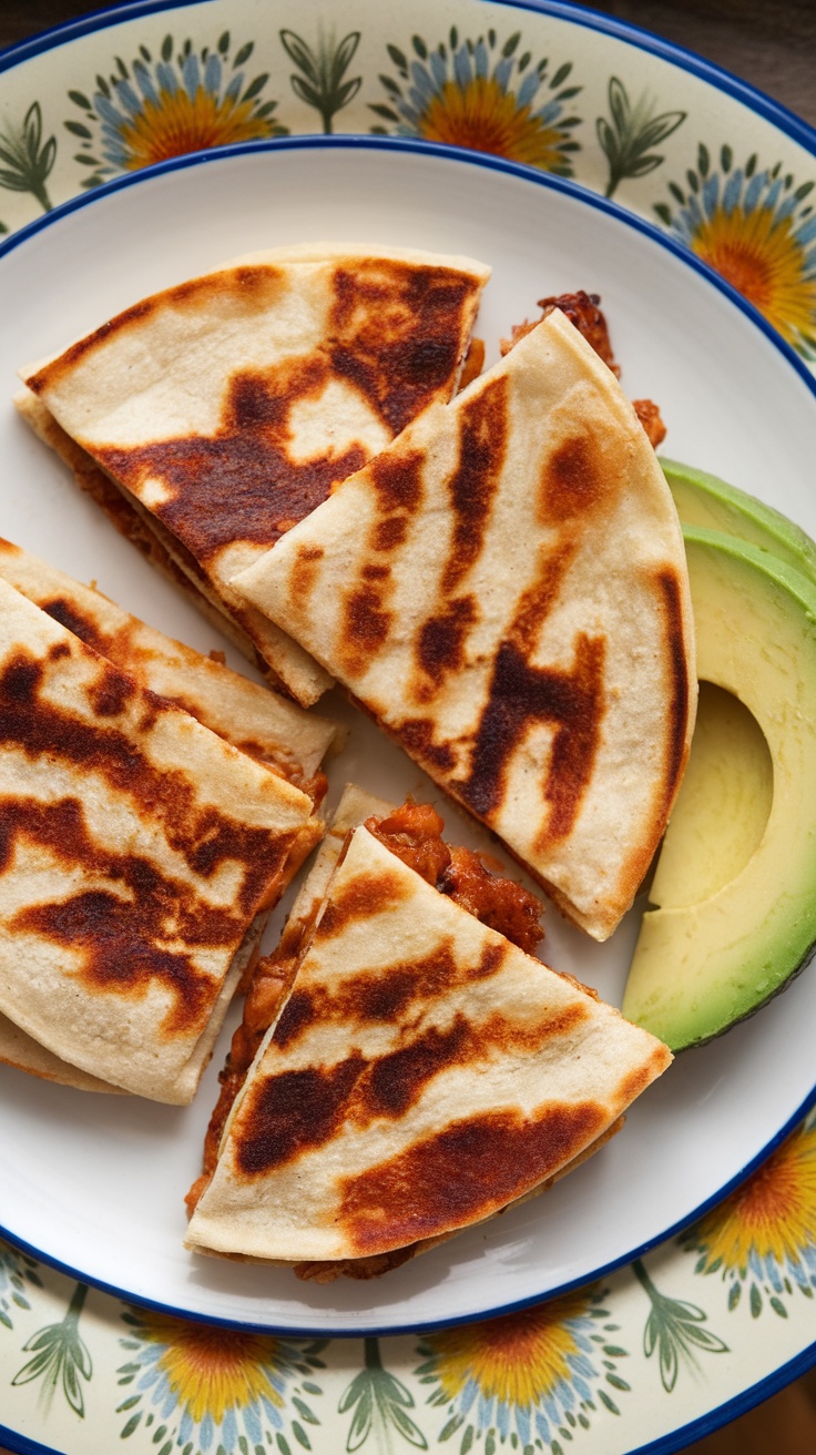 BBQ Chicken Quesadillas with Avocado on a plate