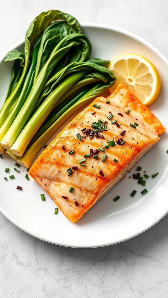 A plate of sesame ginger salmon with bok choy and lemon slices