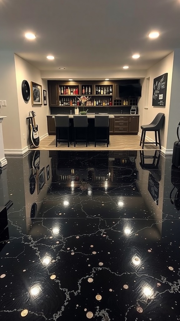 A stylish black epoxy floor in a basement, showcasing embedded objects, with a bar area in the background.