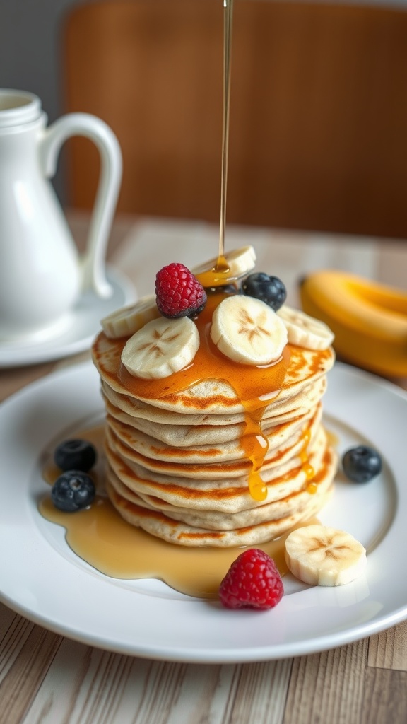 Fluffy banana pancakes topped with maple syrup and fresh berries
