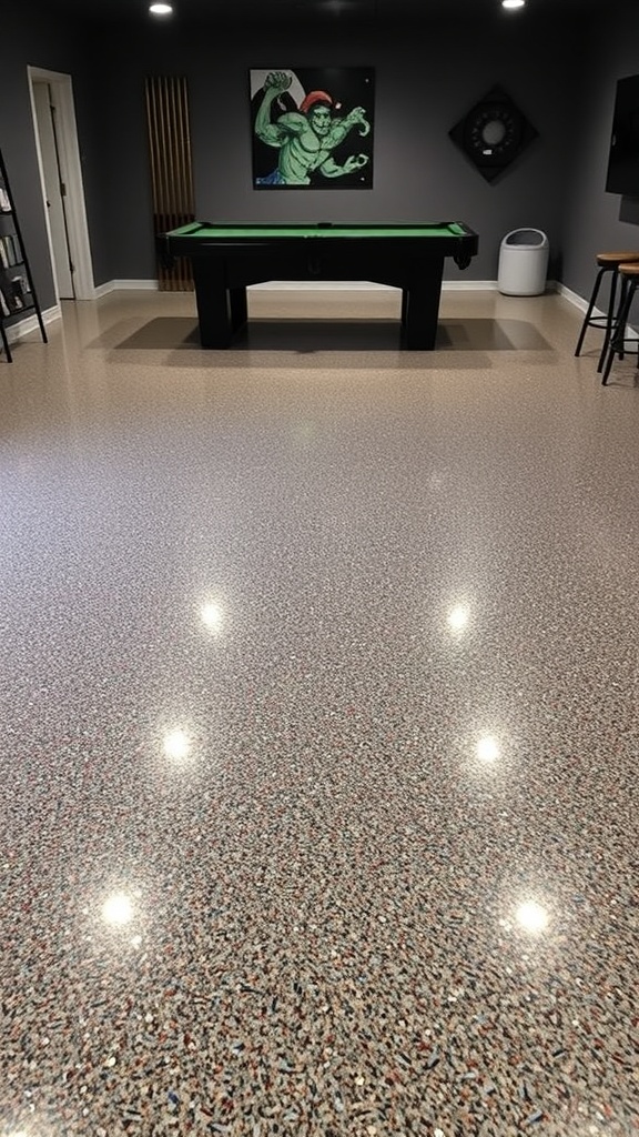 A stylish game room with a seamless metallic epoxy floor, showcasing a mix of dark and light sections, pool table, and arcade machines.
