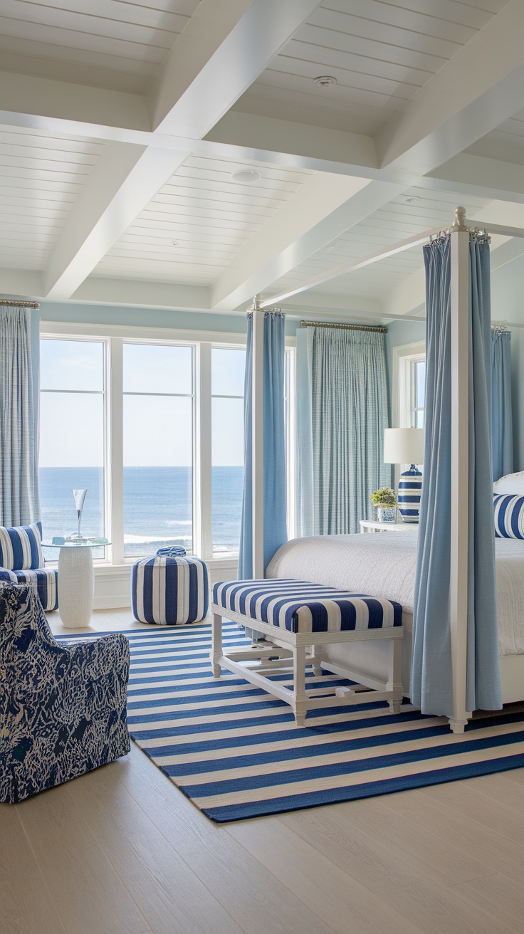 Coastal bedroom with blue and white striped decor and ocean view