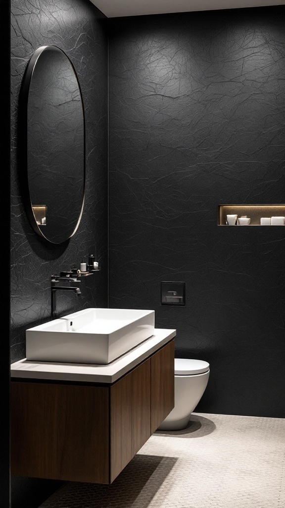 A modern bathroom with black textured walls, a white sink, and wooden cabinetry.