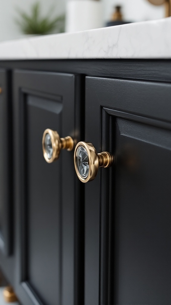 Close-up view of a black bathroom vanity with gold knobs