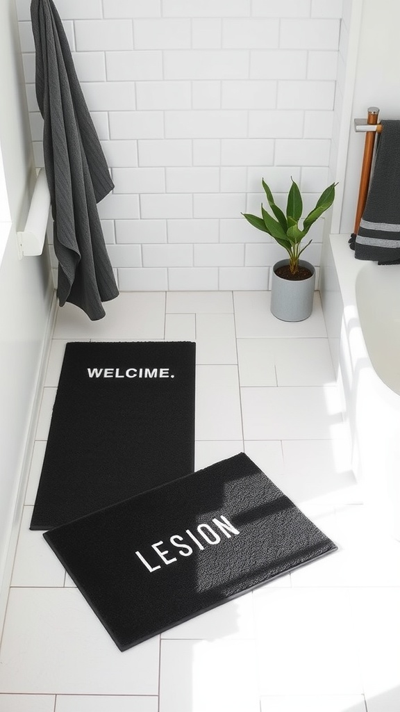 Black and white bath mats in a bathroom with a potted plant.