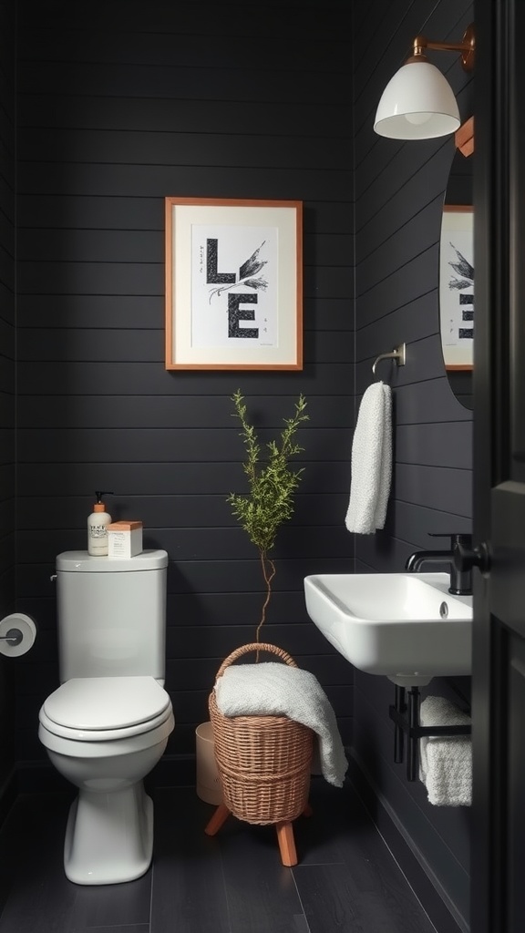 A black shiplap bathroom with minimalist storage solutions including a wicker basket and wall-mounted sink.