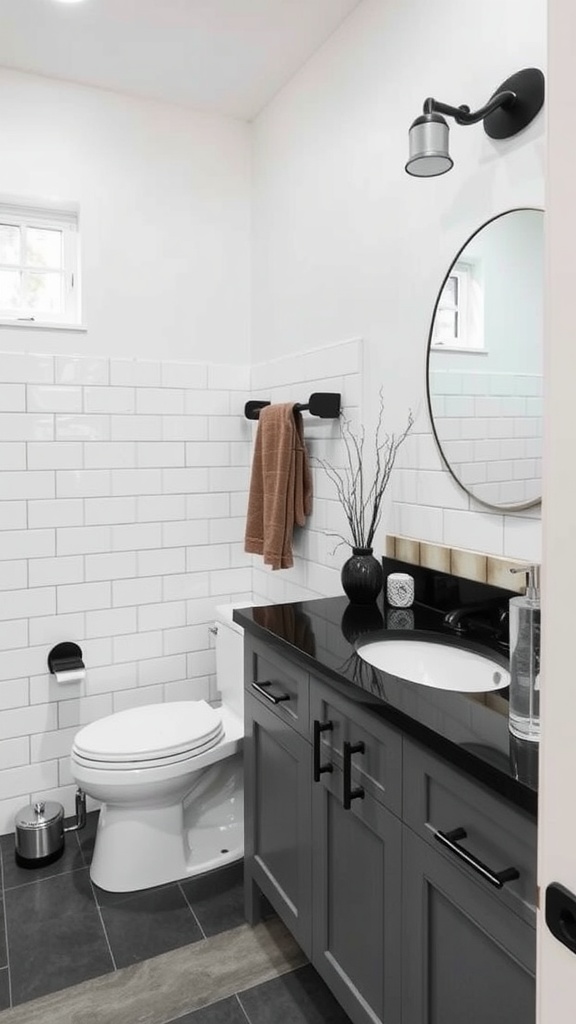 A modern bathroom featuring a black countertop, gray cabinetry, and white subway tiles.