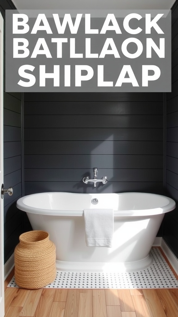 A black shiplap bathroom featuring a freestanding tub, woven basket, and natural wood flooring.