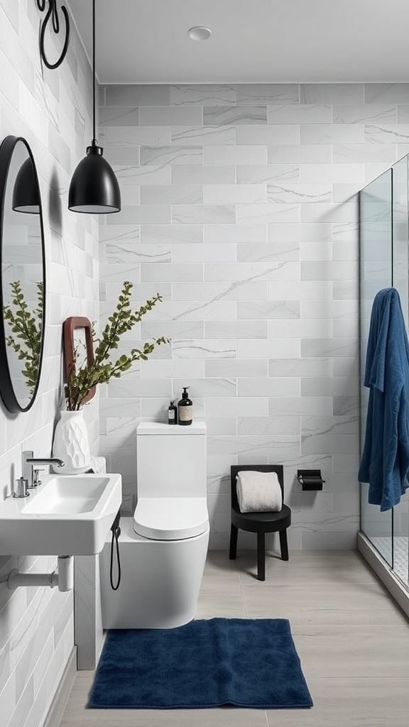 A modern bathroom featuring gray tiles, a sleek toilet, and a stylish mirror