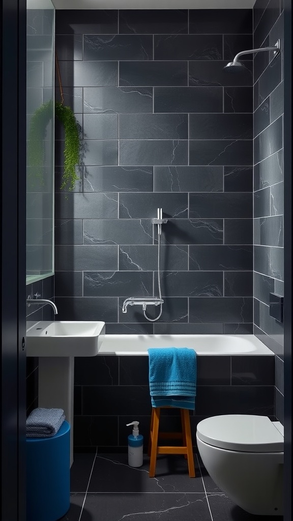 Modern bathroom with dark tiled walls and blue accents