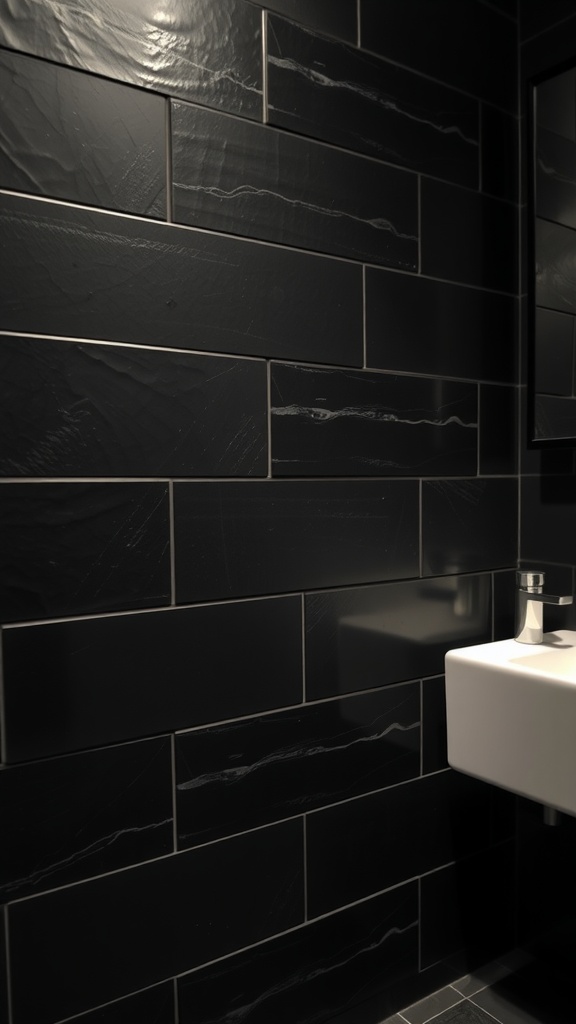 A close-up of textured black wall tiles in a bathroom setting.