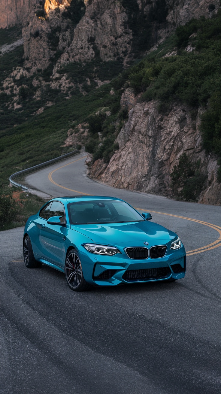 BMW M2 sports car on a winding road in a scenic landscape.