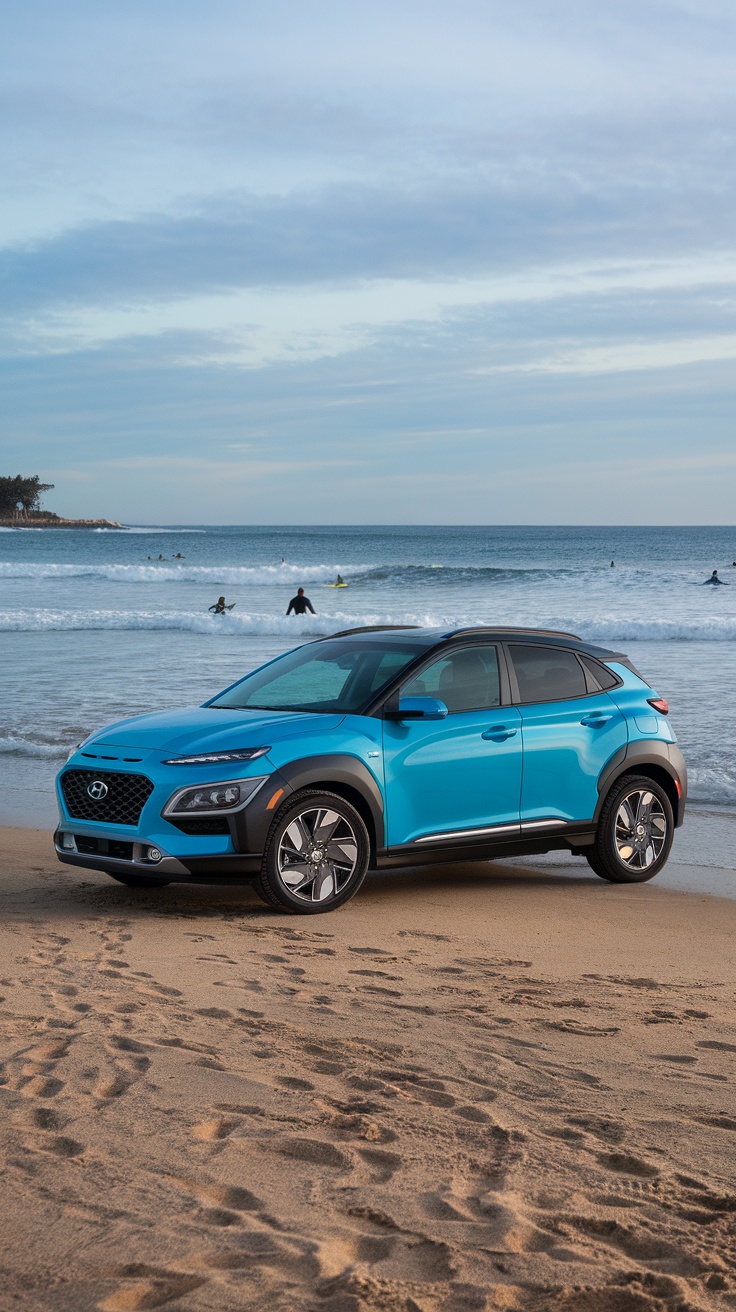 A blue Hyundai Kona parked on the beach with surfers in the background.