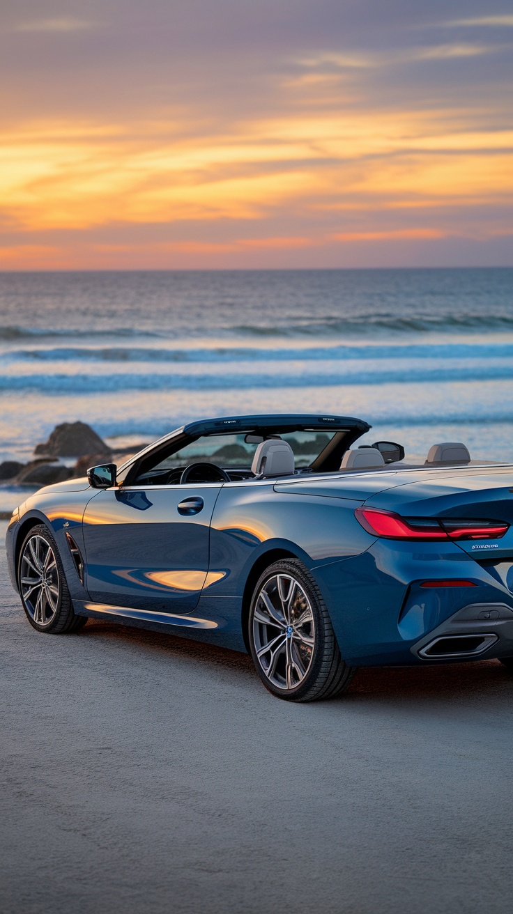 BMW 8 Series convertible parked by the ocean during sunset