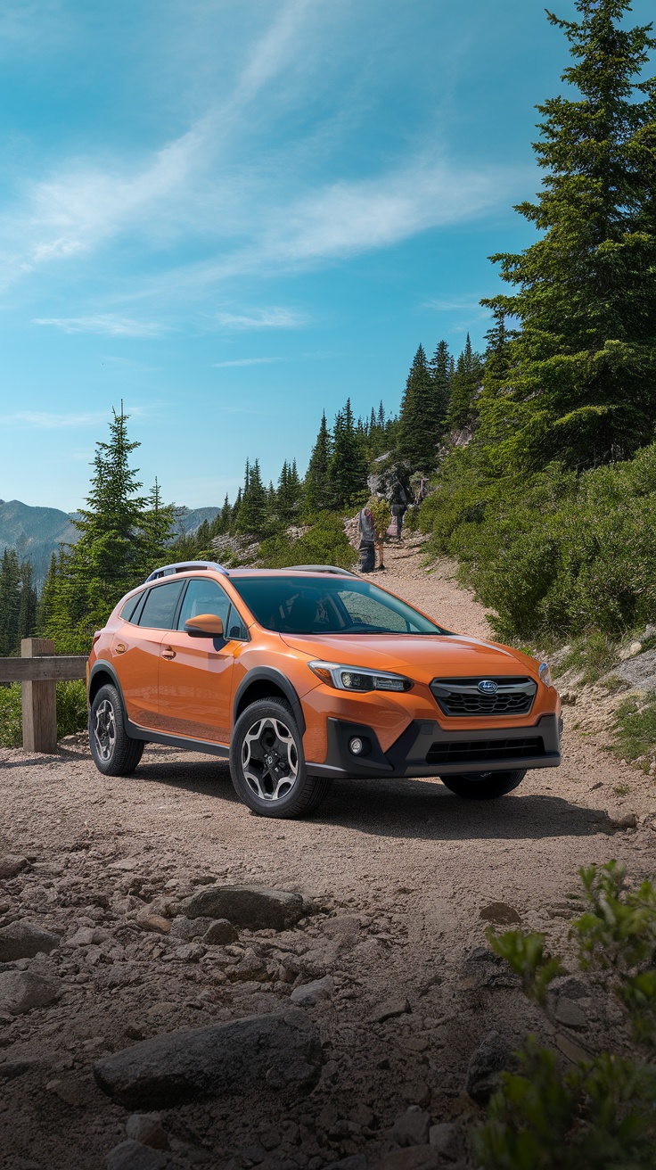 A Subaru Crosstrek parked on a rugged trail surrounded by trees