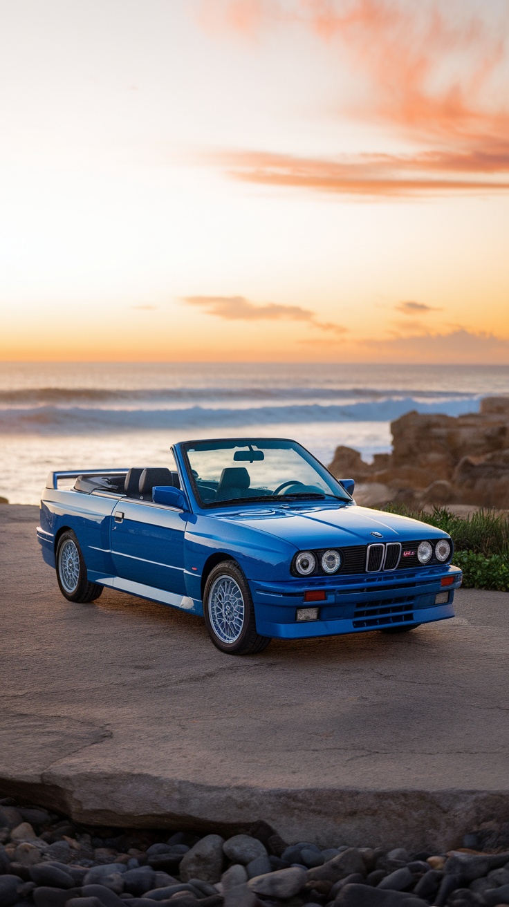 BMW E30 M3 Cabriolet parked near the ocean at sunset