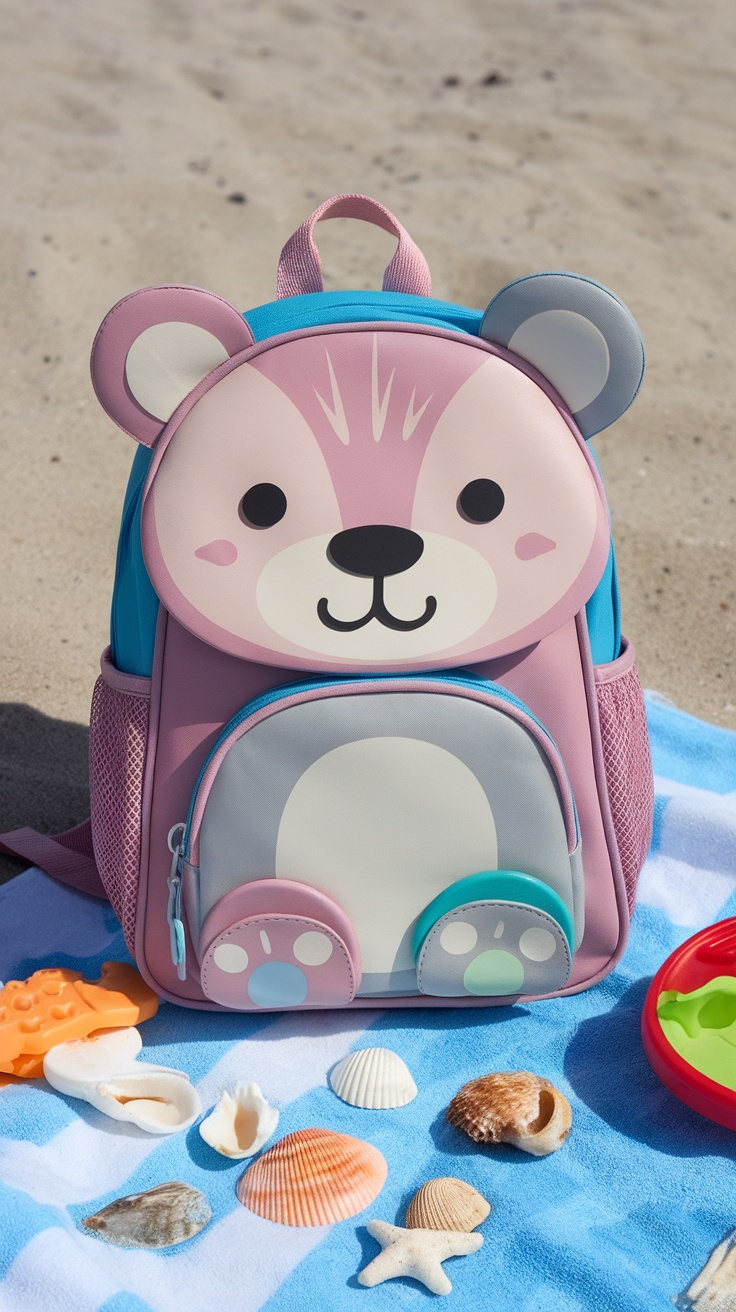 Skip Hop Zoo Little Kid Backpack with a cute bear design on a sandy beach