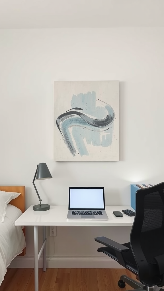 A minimalist dorm room setup with a simple abstract painting on the wall above a desk.