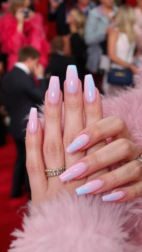 Close-up of hands with cotton candy chrome nails and rings.