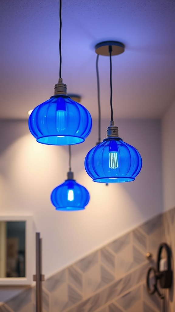 Three blue pendant lights hanging in a stylish bathroom