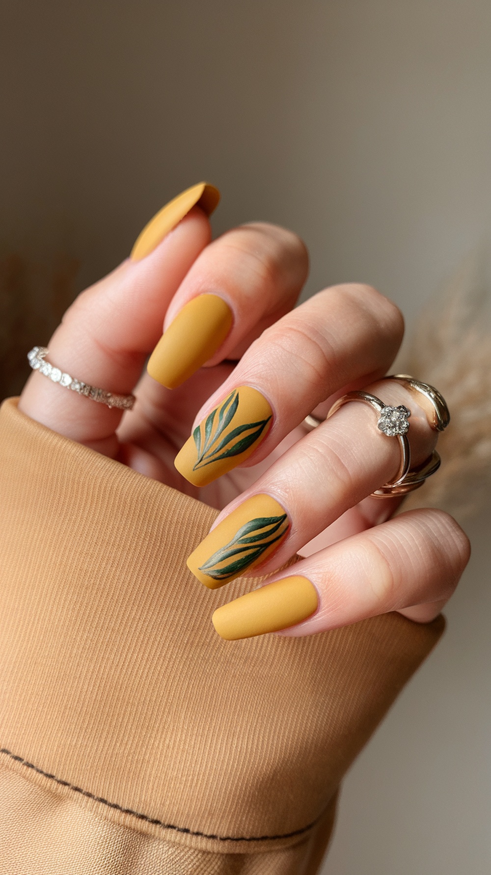 Matte sunflower nails with green leaves design