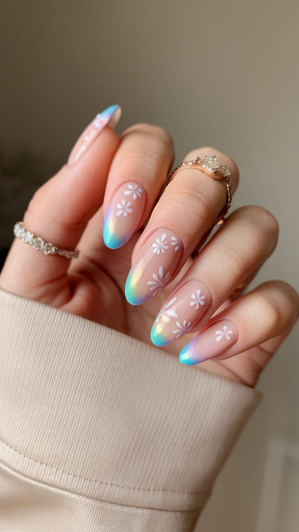 Pastel ombre almond nails with white flower designs