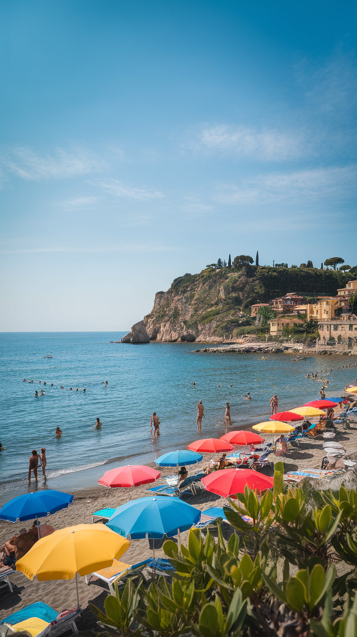 Spiaggia Grande Beach in Positano with colorful umbrellas and people enjoying the beach