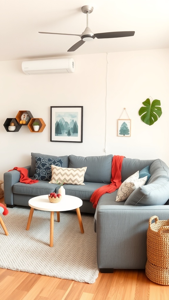 A father and daughter playing on a grey couch in a bright living room
